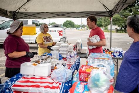 united airlines cargo hold being loaded with aid boxes for kerrville texas flood victims