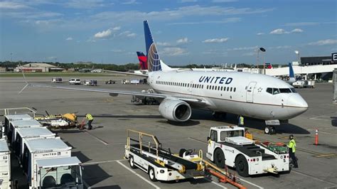 united airlines crew and executives celebrating route launch to kaohsiung taiwan at tokyo narita airport