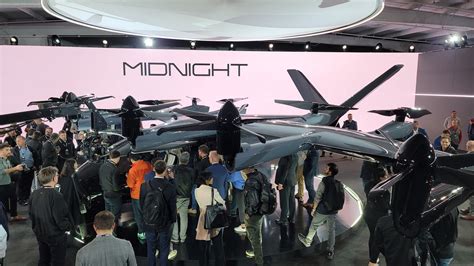 United Airlines executives inspecting Archer Midnight at Palo Alto unveiling event