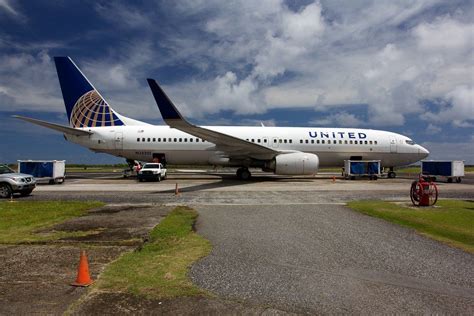 united airlines island hopper aircraft at guam airport