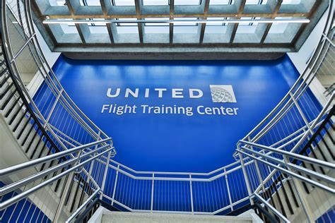 united airlines pilot training center exterior, early morning fog