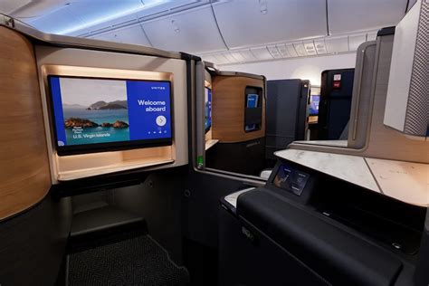 United Airlines Polaris Studio sliding door suite companion dining Boeing 787-9