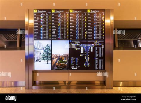united airlines terminal at newark with international flight departure board highlighting funchal and ponta delgada