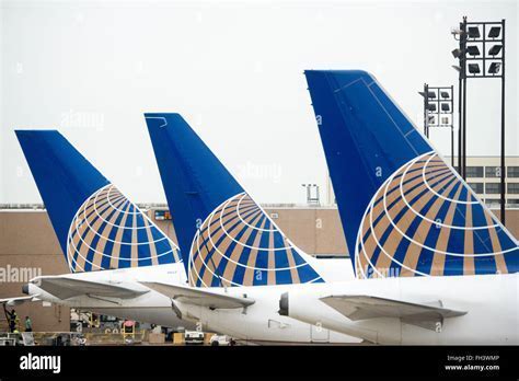 united and continental merged aircraft tails at gate, symbolizing transition period prior to 2012 full merger