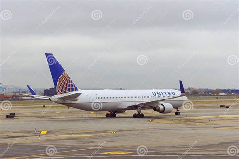 united boeing 767 preparing for transatlantic departure at newark airport