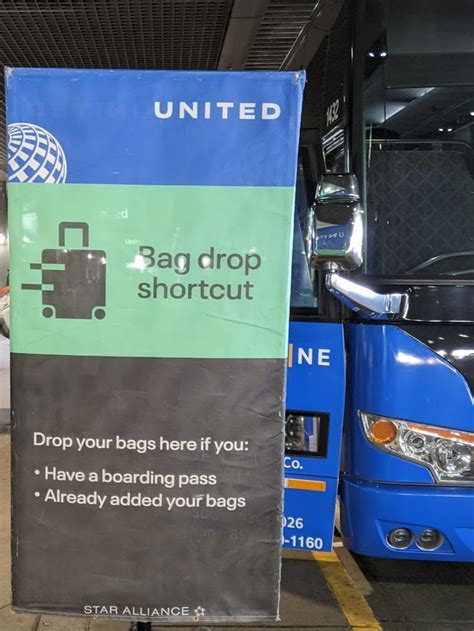 united landline bus at denver airport terminal curbside