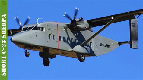United States Army C-23 Sherpa transporting cargo on unpaved runway