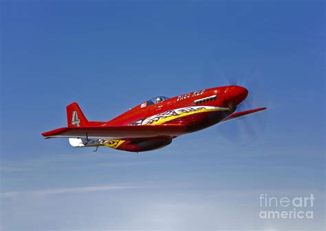 unlimited air racing p-51 mustang dago red racing over desert
