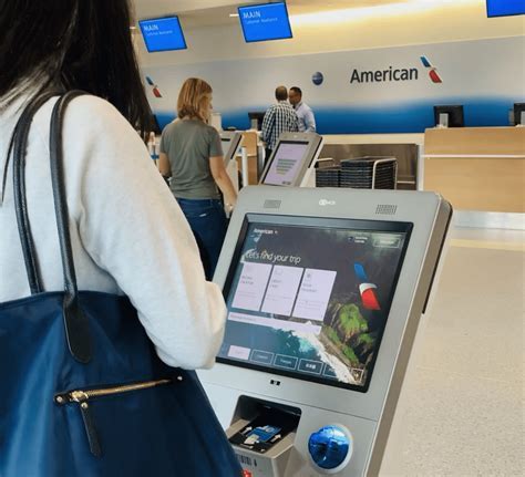 upgraded american airlines kiosk at chicago terminal showing group check-in option