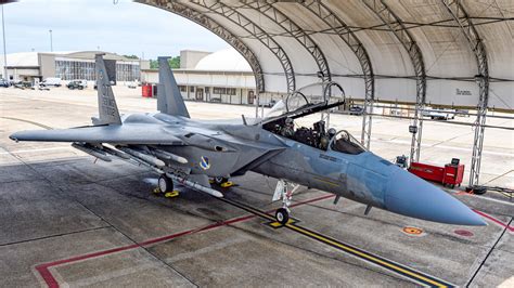 Upgraded F-15E with EPAWSS performing aerial maneuvers