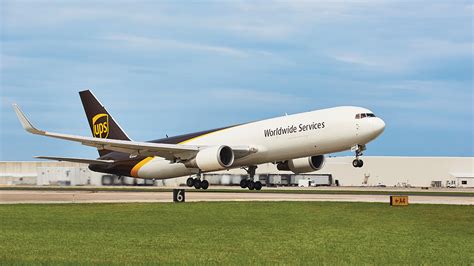 UPS aircraft maintenance hangar with widebody freighter undergoing inspection