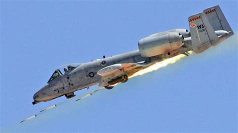US Air Force A-10 launching APKWS laser-guided rocket during training exercise