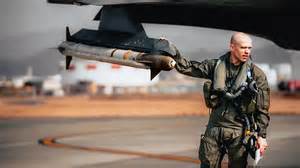 us air force ground crew loading missile onto f-35