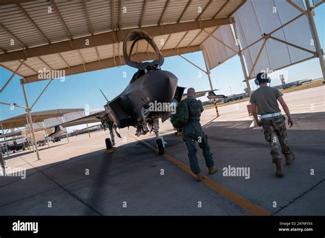 US Air Force maintenance crew servicing F-35A on flight line