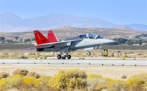 US Air Force T-38 Talon flying beside a modern T-7A Red Hawk over Texas