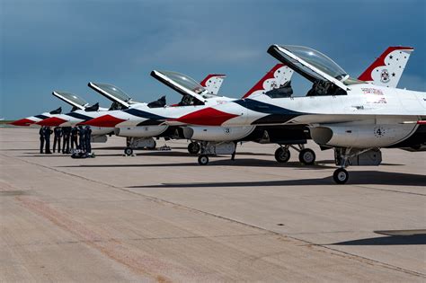 US Air Force wing commander overseeing flightline operations fighter jets parked