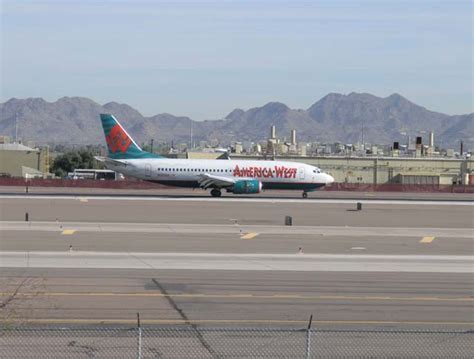 US Airways and America West aircraft parked side-by-side at Phoenix hub in 2005
