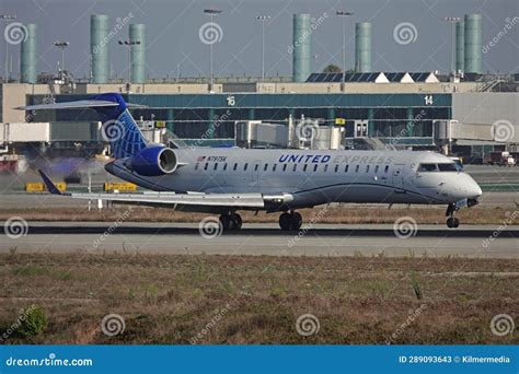 US Airways Express pilots boarding a CRJ700 during morning ramp operations in Charlotte
