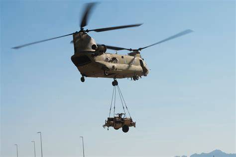 US Army CH-47F Chinook heavy-lift helicopter transporting equipment during field operations