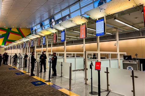 US Customs and Border Protection officers processing passengers at Atlanta International Airport