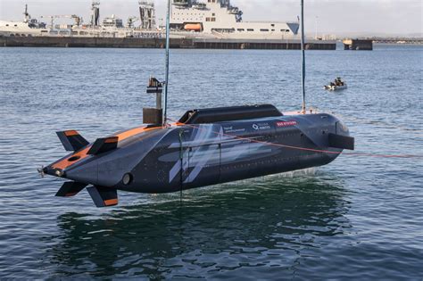 US Navy autonomous submarine releasing underwater drones artificial intelligence