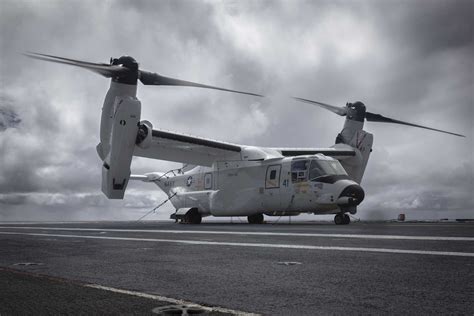 US Navy CMV-22B Osprey tiltrotor aircraft operating from aircraft carrier deck
