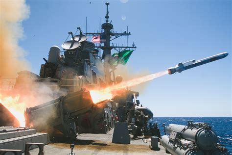 US Navy destroyer launching missile during live-fire exercise in Pacific theater