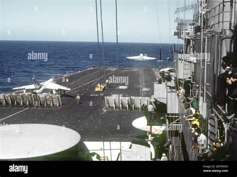 US Navy F-4 Phantom II launching from aircraft carrier deck