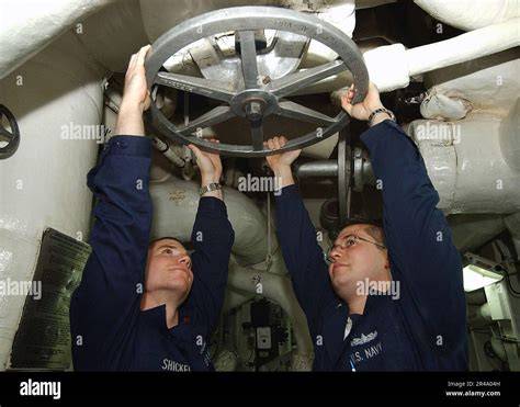 US Navy nuclear aircraft carrier engineering room Machinist Mate