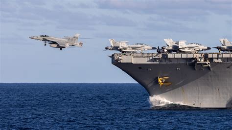 US Navy Super Hornet carrier launch showing the demanding operational environment of naval fighter pilots