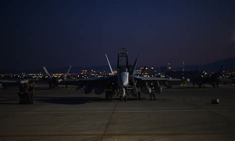 USAF pilot preparing for night training sortie in F-35A, 2025