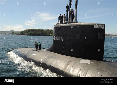 USS Virginia-class submarine cruising at periscope depth near Luzon Strait