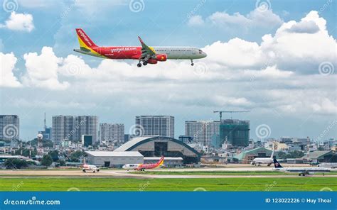 Vietjet Air Airbus with promotional livery parked at Tan Son Nhat International Airport