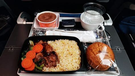 vietnam airlines economy class meal with pho and rice dish