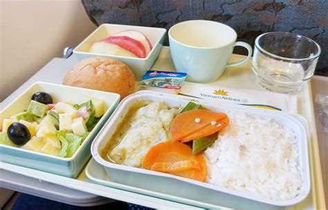 vietnam airlines economy meal tray with pho and rice dishes