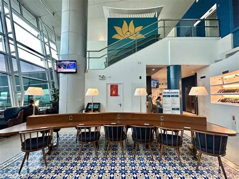 Vietnam Airlines Lotus Lounge with buffet and seating area at Hanoi Noi Bai International Airport