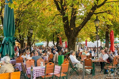 viktualienmarkt gourmet stalls and beer garden tourists munich 2025