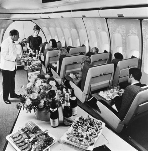 vintage BOAC Comet cabin interior with passengers dining mid-flight
