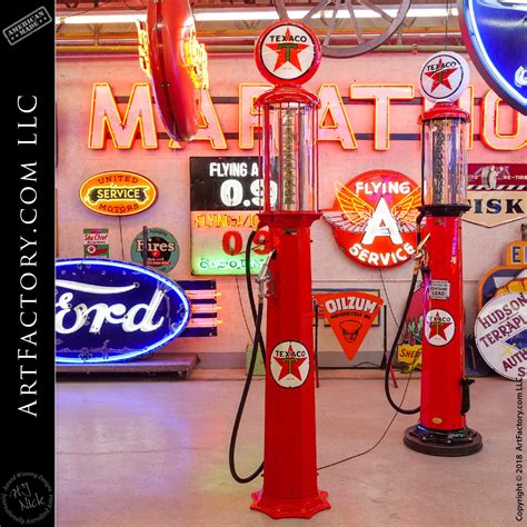 vintage gas station showing color-coded gasoline pumps from mid-20th century