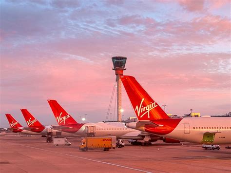 Virgin Atlantic aircraft with Scarlet Lady nose art and Union Flag winglets