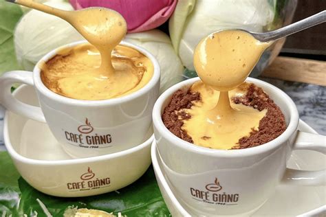 Visitors enjoying egg coffee and traditional drinks at Hanoi Drinks Festival