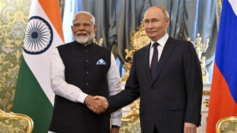 Vladimir Putin and Indian defense officials during bilateral summit in New Delhi