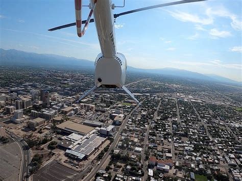 volare helicopters pilot briefing tucson skyline background