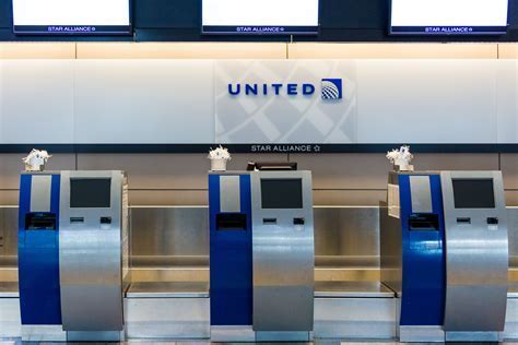 washington dulles united check-in counters with jackson hole signage