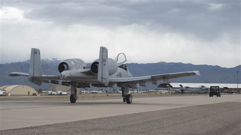 weathered C-130 tail numbers visible at Davis-Monthan boneyard