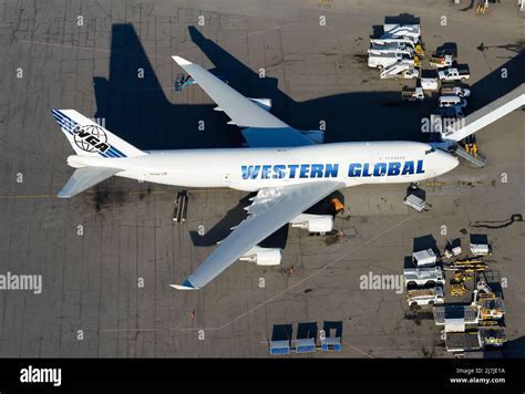 western global airlines cargo loadmaster supervising aircraft loading