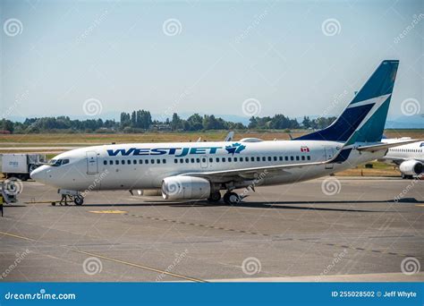 WestJet aircraft at Vancouver International Airport during peak season
