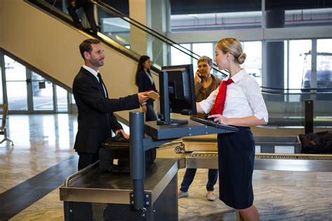 westjet and aeromexico staff shaking hands at boarding gate