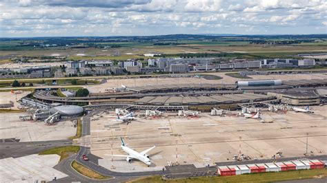 westjet crew at paris charles de gaulle with canadian flags