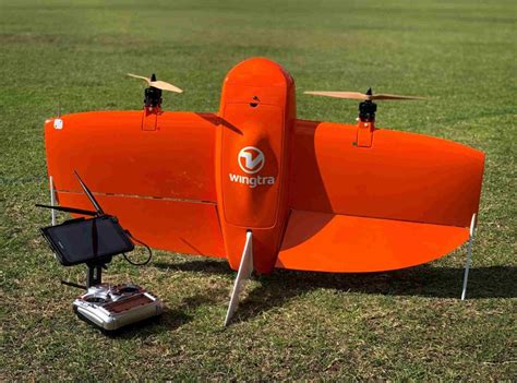 WingtraOne VTOL drone conducting topographic survey over agricultural land